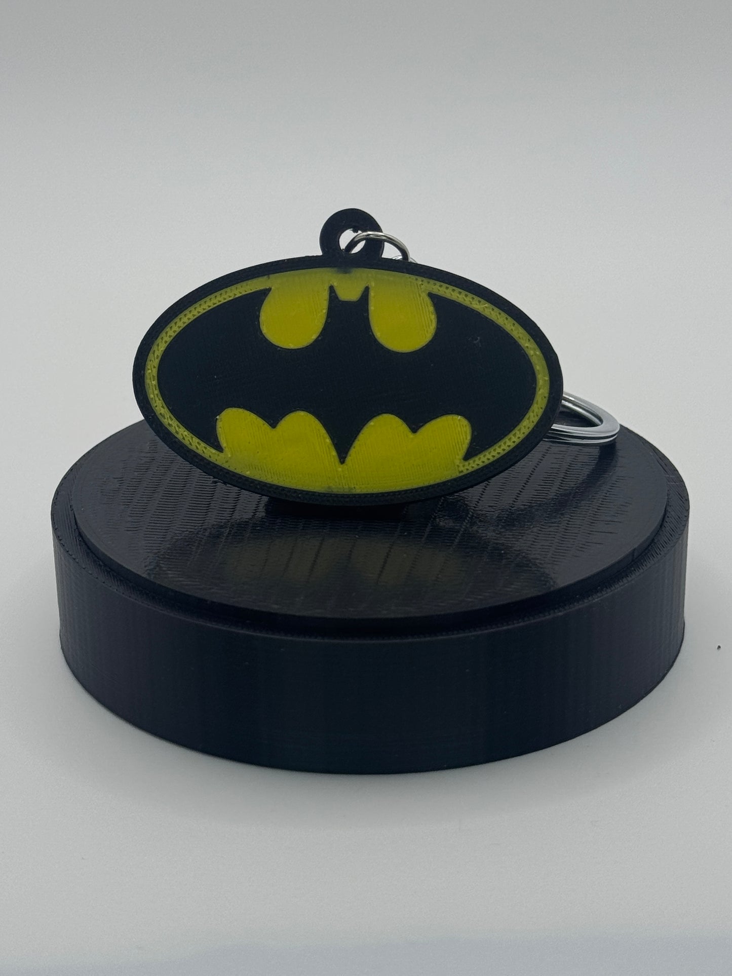 🦇 “I Am the Night” — Batman Emblem Keychain - MacGuffin Shop